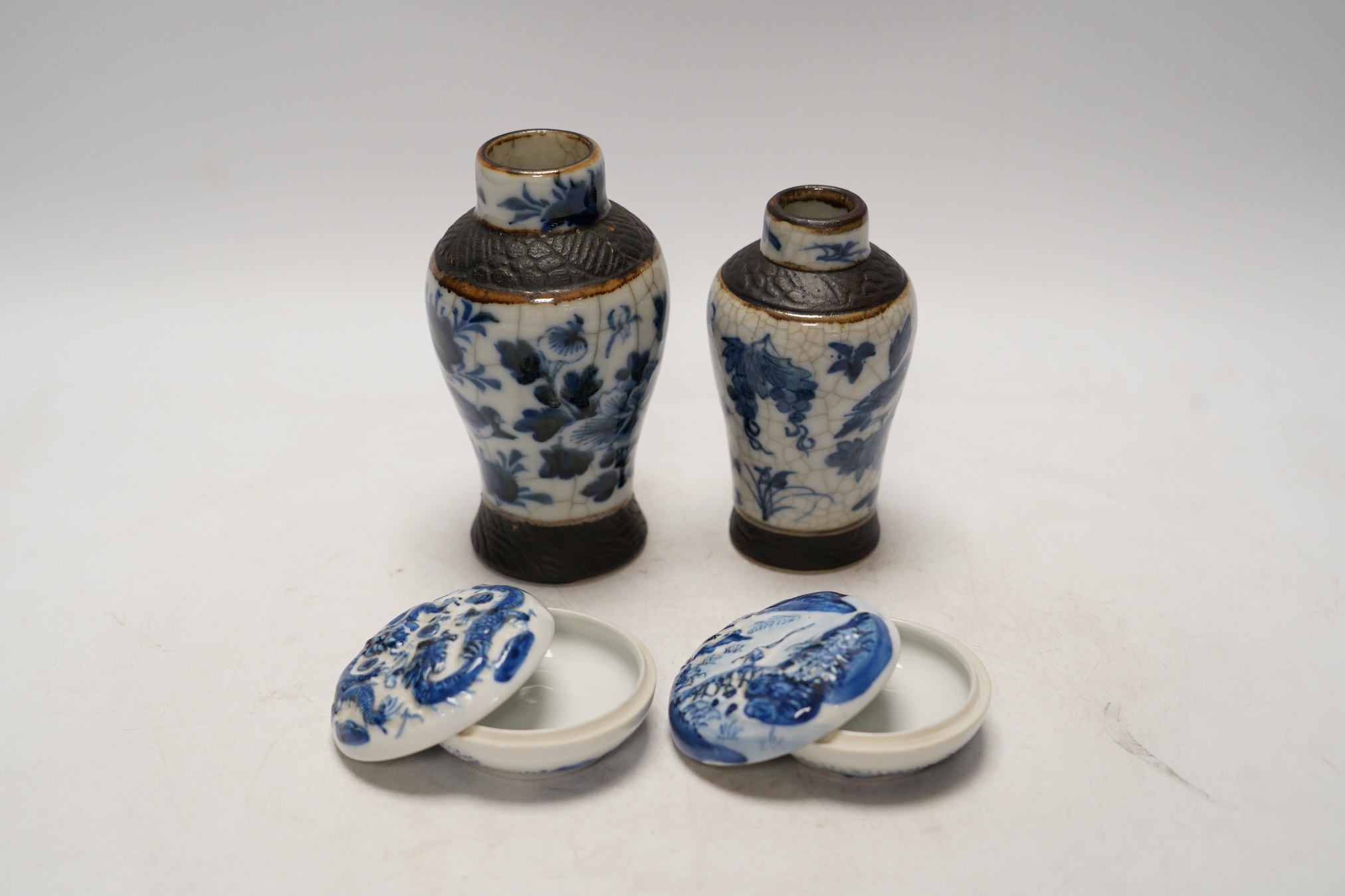 Chinese blue and white ceramics comprising crackle glaze vases and circular seal pots (4). Condition - fair to good, a few minor chips